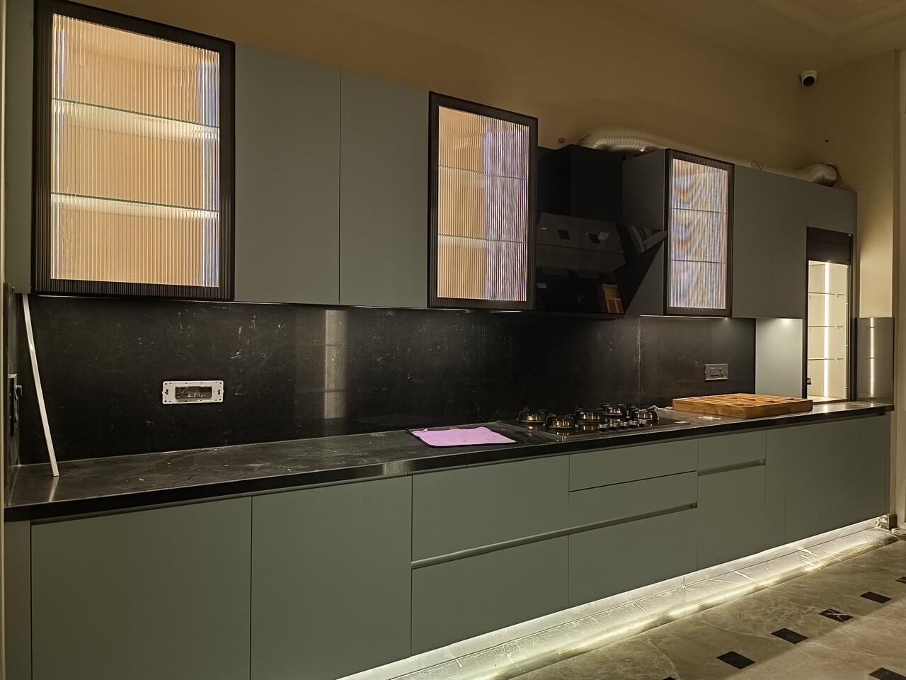 Sage green kitchen black granite Gurgaon